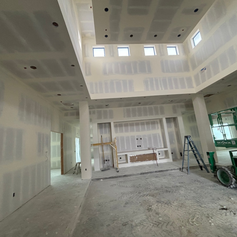 Drywall installation by a trusted contractor, demonstrating various project stages