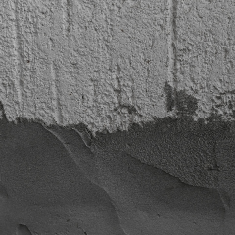 Close-up of a textured wall with a rough surface